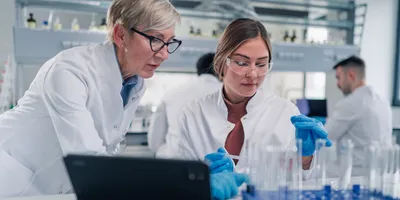 Women collaborating in a laboratory setting