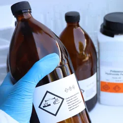 Chemical containers highlighting lab safety practices