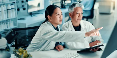 Scientists analyzing AI-generated outputs in a lab